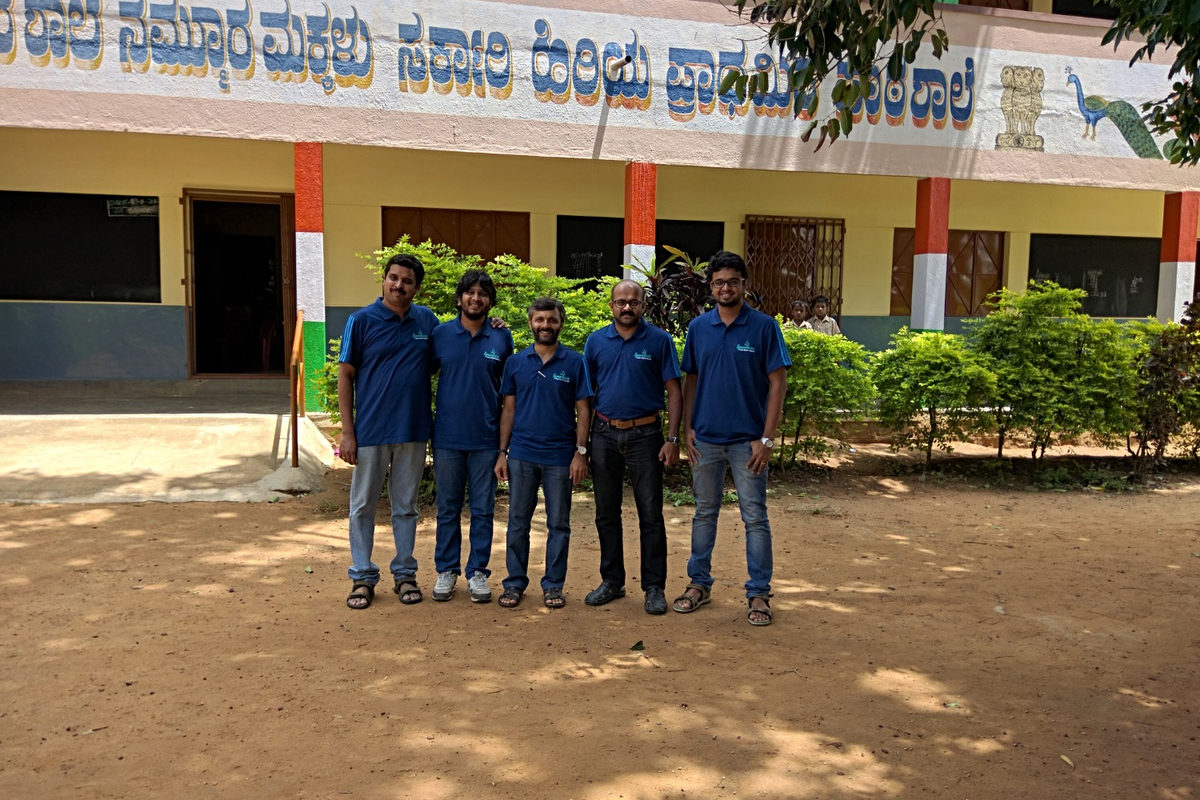 Spandana volunteers outside a government school